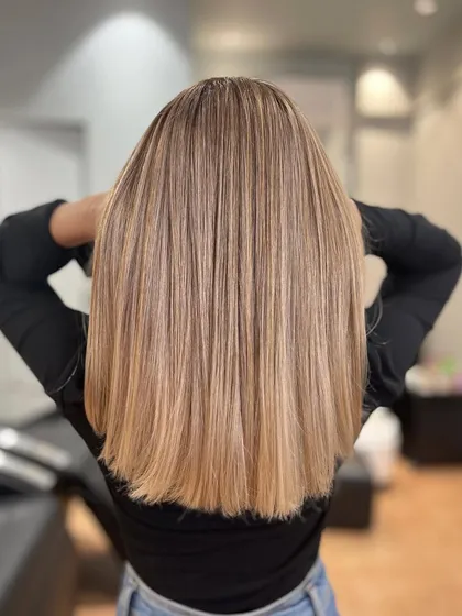 The back view of the Airtouch Balayage, showing how the technique creates a flawless, natural-looking gradient.