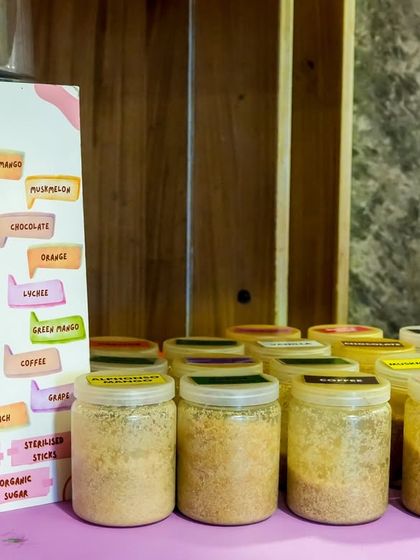 Our cotton candy station offers a variety of delicious flavors for guests to choose from.