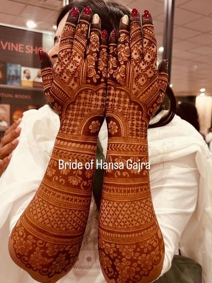 The color of mehendi says it all. This photo shows a deep, rich stain on a full-coverage back-of-hand design, a testament to the quality of natural henna and proper care.