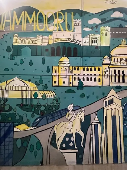 A clearer shot of the Bangalore-themed mural, free from obstructions, highlighting the city's blend of heritage and modernity.