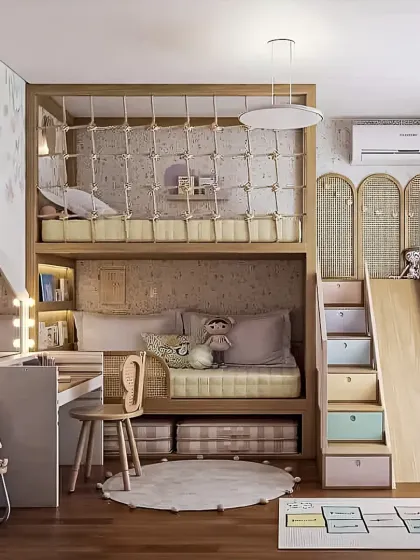 This whimsical kids' room is built for fun and function, featuring a custom loft bed complete with a safety net, a playful slide, and built-in storage drawers. We also integrated a compact vanity and desk area, making it a space that encourages both creativity and organization.