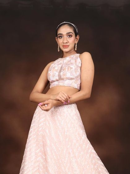 A classic portrait for the day party look. The minimal jewelry and clean makeup make this ideal for a variety of daytime occasions.