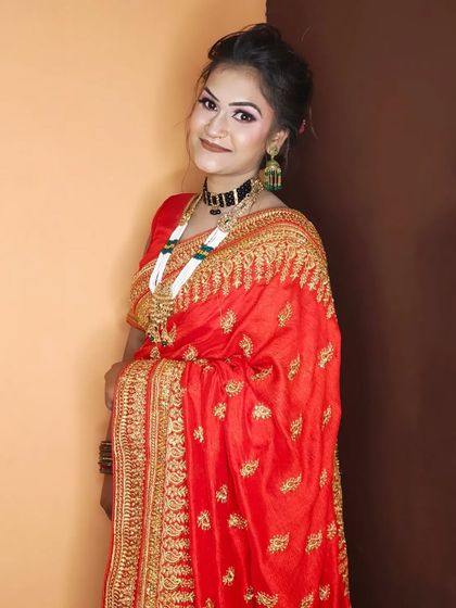 The client looks happy and confident, ready for her special occasion.