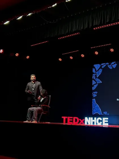 Performing on the iconic red circle of a TEDx stage is always an honor. This was at TEDxNHCE, where I shared my perspective on illusion, perception, and the psychology behind the magic we experience every day.