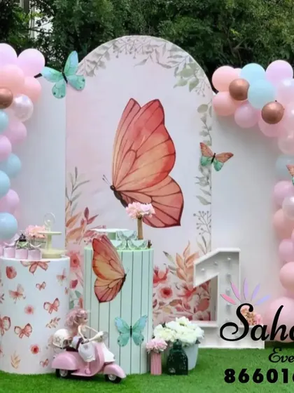 We make children's birthday dreams come true with detailed themed decorations. This butterfly theme features pastel balloon arches, custom backdrops, and themed props that create an enchanting atmosphere for your child's special day.