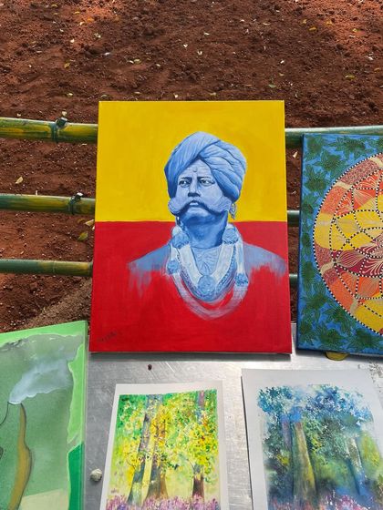 My Kempegowda painting displayed alongside other artworks at the Art in the Park event.