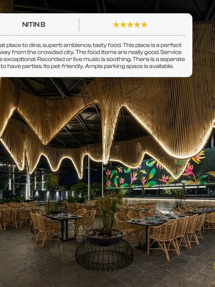 This is the main dining hall, with its unique, flowing ceiling made of natural fibers and lit to create a warm, inviting atmosphere. It’s a view our guests often praise, and it perfectly captures the blend of nature and design I aimed for.