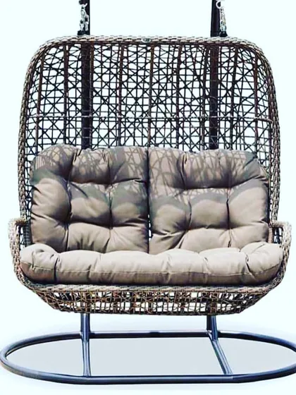 A classic double-seater egg swing with a stand. This is a great option if you can't hang a swing from the ceiling. It’s cozy, comfortable, and can be placed anywhere in your garden or on your terrace.