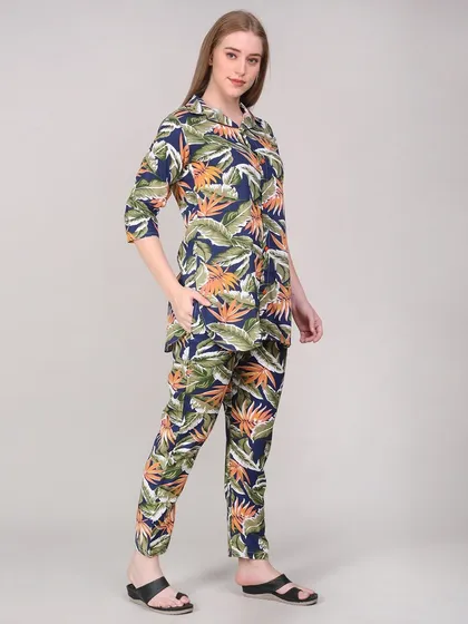 A three-quarter view of the loungewear set, with the model's hand in the pocket to demonstrate the garment's functional features.