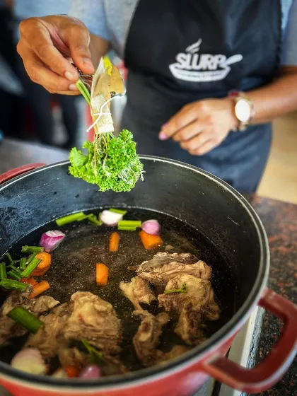 Making a classic stock, the foundation of countless sauces and soups. Students learn to extract flavor from bones and vegetables.