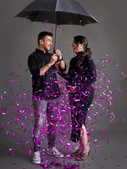 Let's celebrate your new beginning with a splash of fun. I love collaborating with couples on creative concepts for their maternity shoots. This confetti reveal under an umbrella brought so much energy and excitement to the studio, resulting in a unique and playful portrait that perfectly captures their happiness.