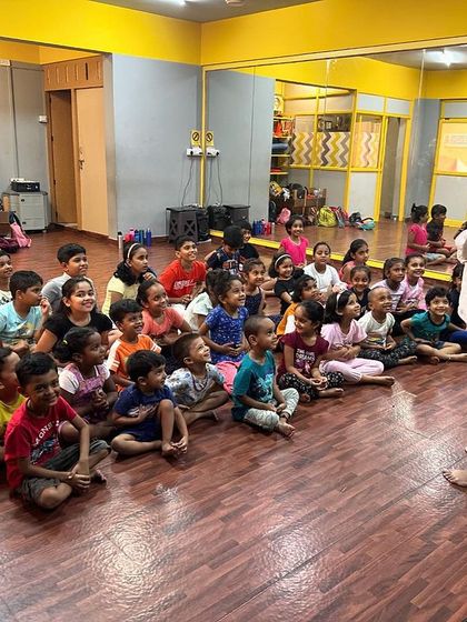 Interacting with the audience during a show at a dance studio. I love getting off the stage and bringing the puppets up close to the children.