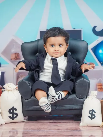 Looking very serious about his business, this Boss Baby is ready to make a deal. The props like money bags and a mini briefcase complete the look.