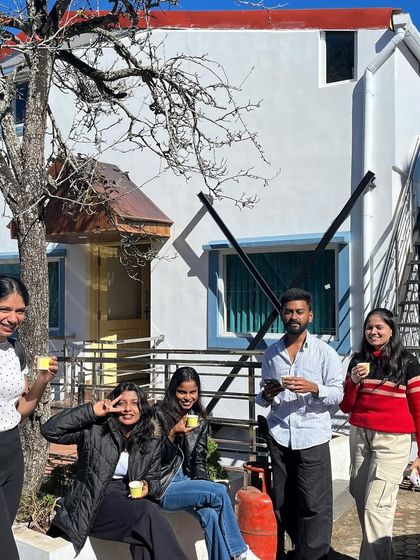 Enjoying a warm cup of tea or coffee outside our cozy hilltop stay on a cool morning.