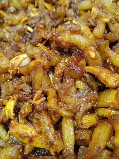 A close-up of the crispy pork fat, showing its texture. This is a popular item for those who enjoy the richer parts of the pork.