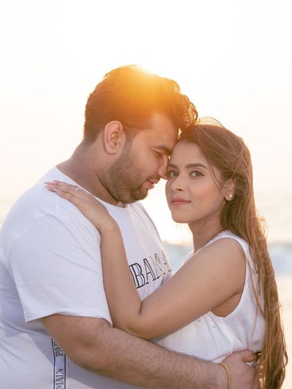 A beautiful sun-kissed portrait of the couple on a Goan beach, perfect for a romantic and dreamy pre-wedding album.