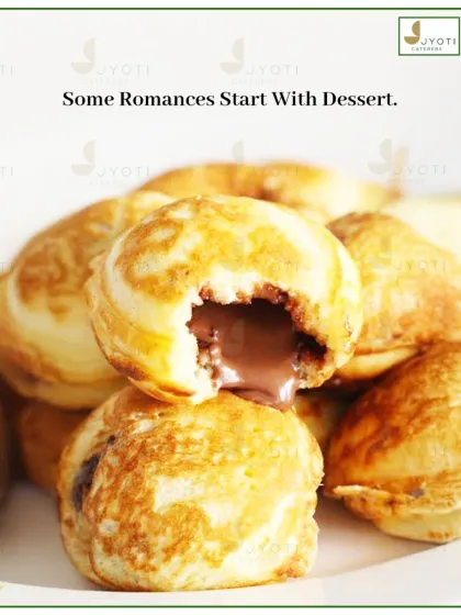 Some romances start with dessert. These Dutch poffertjes, or mini pancakes, are filled with molten chocolate, offering a warm and comforting treat.