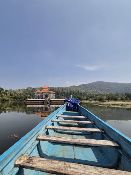 A boat ride towards the beautiful Varanga Kere Basadi, a Jain temple located in the middle of a lake.