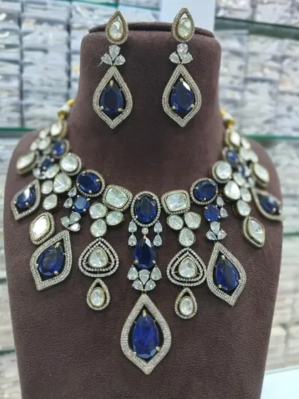A sapphire blue version of the statement necklace. This is a bold and royal rental choice for an evening reception.