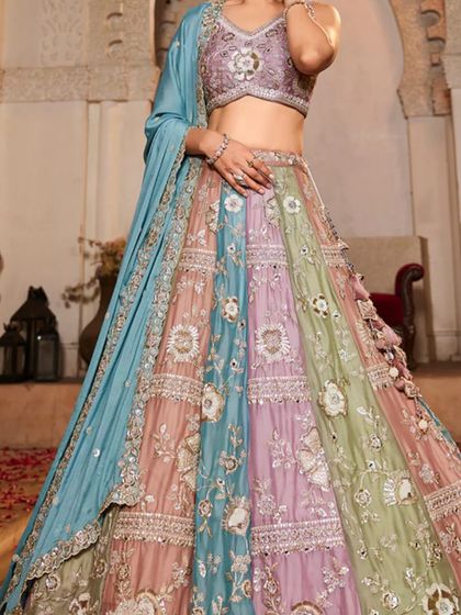 Another view of the pastel panelled lehenga, showing the intricate work on each panel.