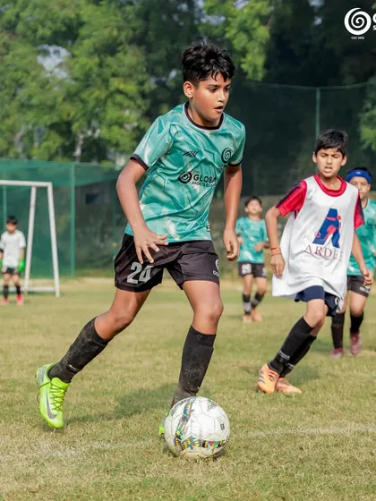 A GSC player dribbles forward, looking for an opening in the Ardee School defense.