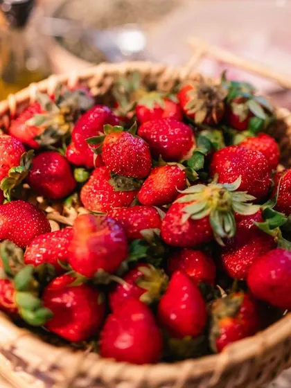 A basket of fresh, juicy strawberries, highlighting our use of fresh, seasonal produce in our brunch buffets.