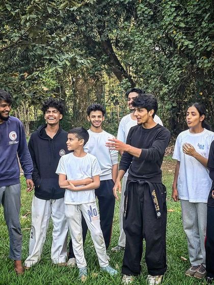 Discussing techniques and sharing feedback. We foster an environment where everyone helps each other improve.