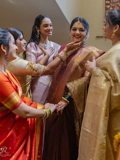The bride's friends showering her with love and affection just before the ceremony. These are the unscripted moments I live for.