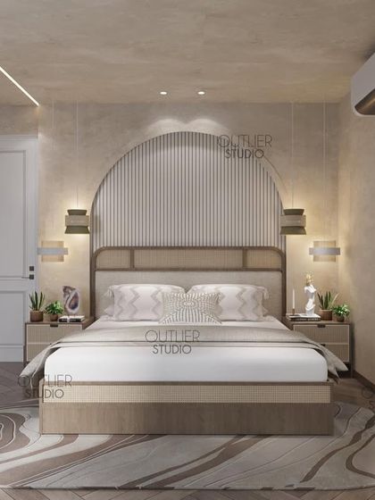 Where every day begins and ends peacefully. This bedroom uses an arched headboard with fluted paneling and a neutral color palette to create a calm, contemporary, and restful space.
