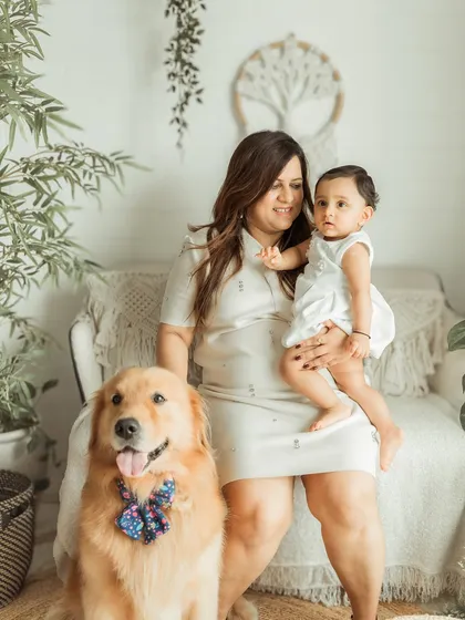 Because pets are family too. This shot from an indoor family session shows how we can include your beloved dog, creating a complete and joyful family portrait.