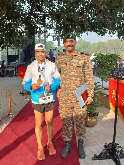 A proud moment, receiving my medal at the Kargil Vijay Diwas Honour Run, standing alongside an army officer.