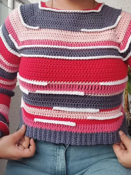 A full front view of the Candy Crush Pullover, showing the playful arrangement of colors and textures.