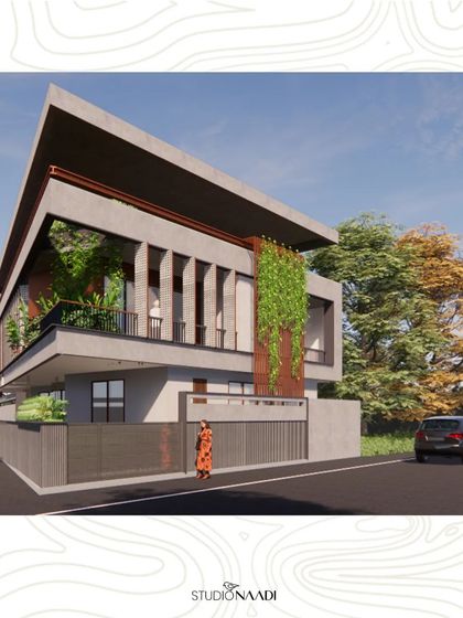 The 'Ayana' residence in Gulbarga was designed for a harsh, dry climate. The facade features concrete fins that provide shading, while integrated planters and a vertical green wall help cool the building and add a biophilic element.