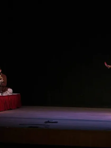 A wide view of the stage during a solo recital, with the live orchestra providing the soul-stirring Carnatic music. The interplay between the mridangam, violin, vocals, and my ghungroos creates a truly complete and immersive experience.