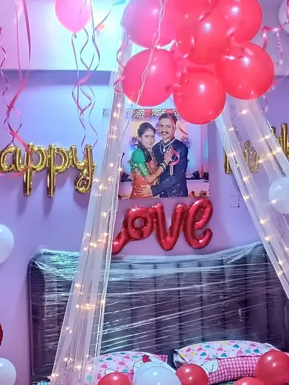 A close-up of the personalized canopy decoration, featuring a photo of the couple.