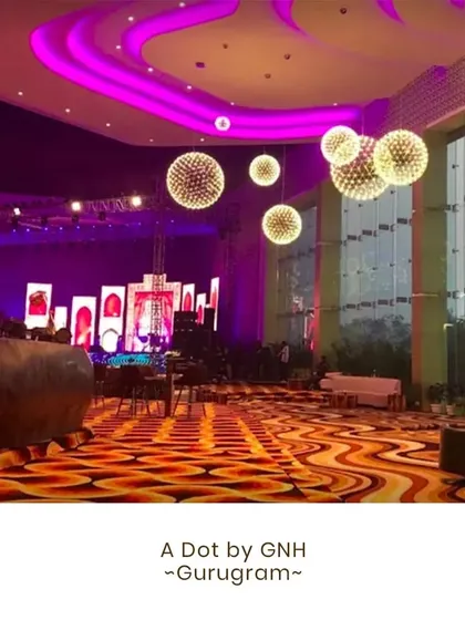 The venue is the canvas for your event. This is the grand interior of 'A Dot by GNH' in Gurugram, a venue where our sprawling food counters and culinary displays can create a truly magnificent wedding experience.