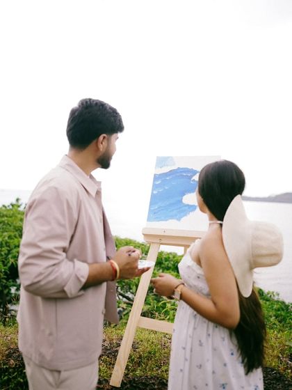 A close-up of the couple as they paint together. This pre-wedding session was about creating something beautiful, a perfect reflection of the life they are building.