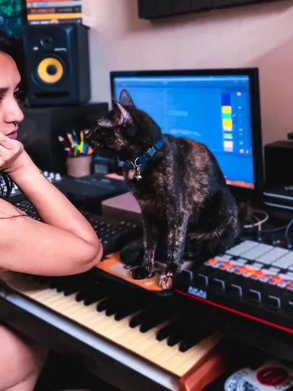 My cat often keeps me company during long studio sessions. It’s a reminder to find balance and joy in the process. My studio is a space of comfort and creativity, which I love sharing with my students.