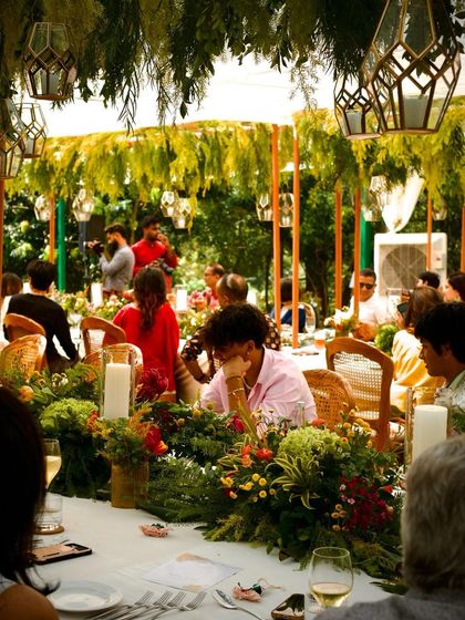 A beautiful shot of a lush, green tablescape at an outdoor event in Nandi Hills.