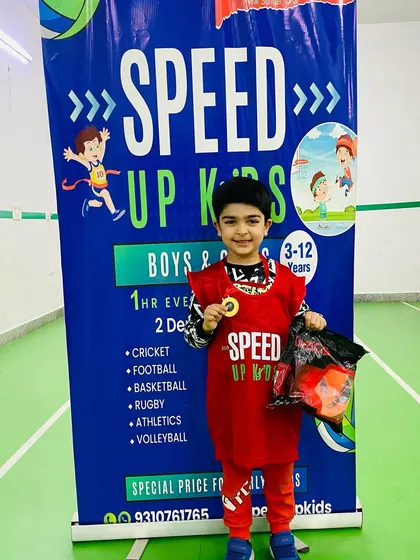 Khiansh Anand, our 'Most Valuable Kid of the Month', looking proud with his medal and prize.