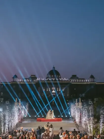 The entire palace facade becomes a canvas for light and pyrotechnics during the Varmala. My production expertise allows me to transform architectural landmarks into integral parts of the celebration.