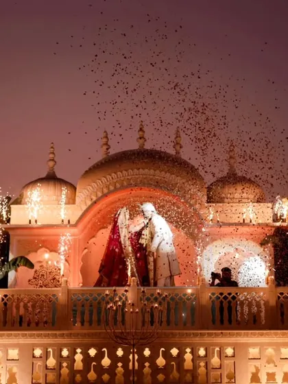 This is the moment a fairytale becomes real. Against the majestic backdrop of Nahargarh Palace, the varmala exchange was lit by a cascade of fireworks and petals. We designed this moment to be the pinnacle of romance and grandeur, ensuring the scale of the celebration matched the depth of the couple's love story.