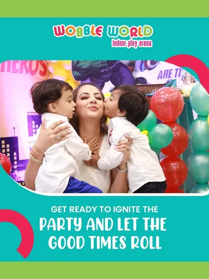 A heartwarming moment between a mother and her twin boys at their superhero-themed party. We provide the backdrop for these cherished family memories.