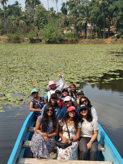 A boat ride through a lake covered in water lilies, a beautiful sight on our Udupi trip.
