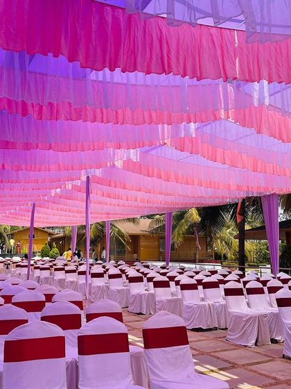 The seating arrangement for the purple Haldi, with rows of chairs ready for a grand celebration.