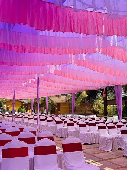 The seating arrangement for the purple Haldi, with rows of chairs ready for a grand celebration.