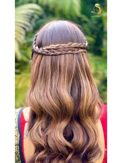 A close-up of the double braided crown, showing the neatness of the work.