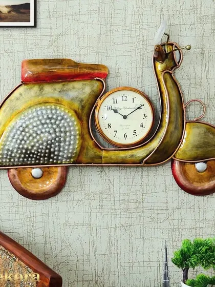 Add a touch of retro fun with our metal scooter wall clock, a quirky and colorful piece that brings personality to a cafe, office, or living space.