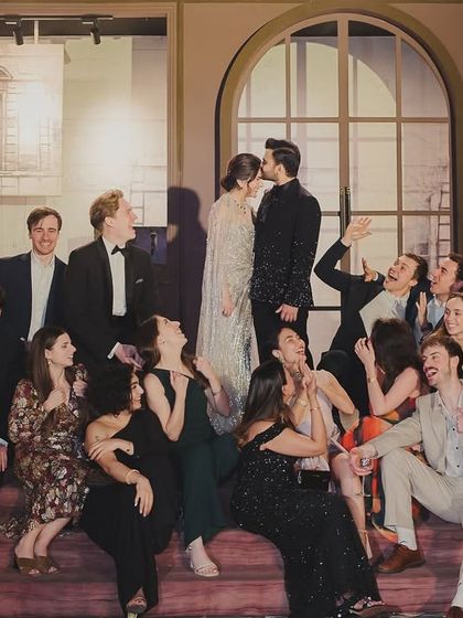 A fun group photo that captures the playful spirit of the Parisian cocktail night. It is all about creating memories with the people who matter most.