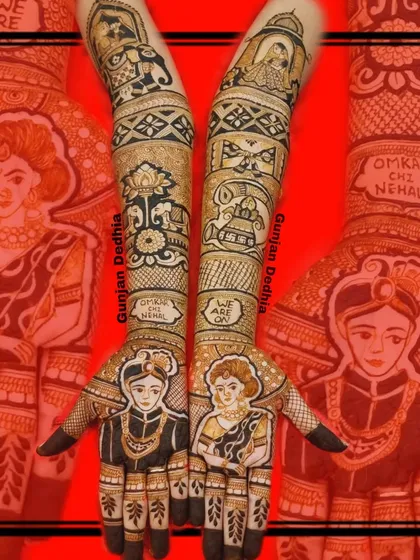 A full view of the 'Omkar chi Nehal' bridal mehendi. The design extends up the arms with traditional symbols, complementing the personalized portraits on the palms.